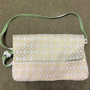 Top it off! Purse brand new no tags never used.